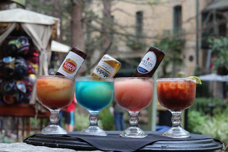 Frozen margaritas with beer toppers on the River Walk